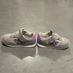 Kids New Balance Gray Sneakers with Purple Highlights